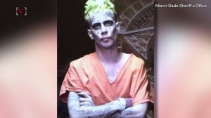 No, it's not a scene from 'The Dark Knight,' but a guy tattooed to look like the Joker has been arrested for waving a gun in the street. Nathan Rousseau Smith (@fantasticmrnate) explains.